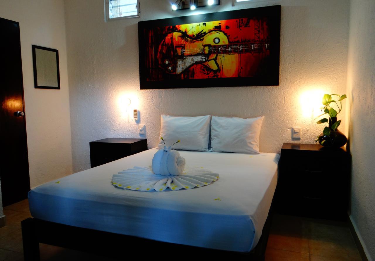 Casa Tucan Hotel Плая-дель-Кармен Экстерьер фото